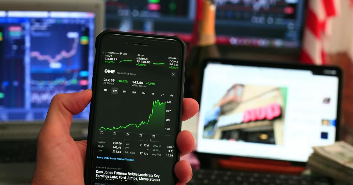 Smartphone met beursapp toont geld verdienen met technologie